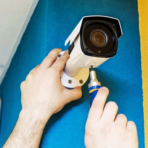 Man installing CCTV Camera