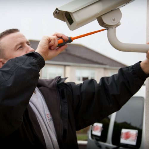 man installing the CCTV Camera